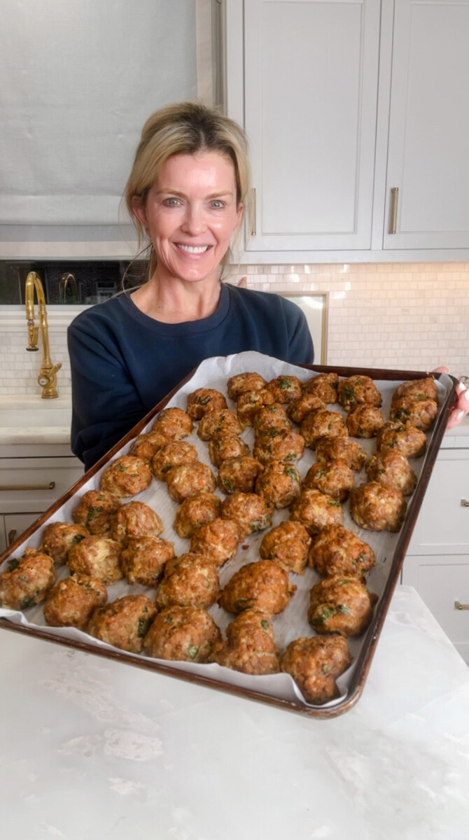 Jamie Tarence of Family Savvy holding a tray of Chattown Meatballs