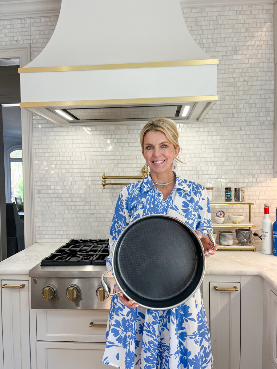 Jamie Tarence of Family Savvy holding a Hexclad pan