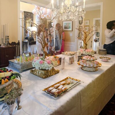Baby shower hors d'oeuvres on a white table cloth