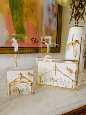 Close-up of Debra Hewitt Art's gold and pastel acrylic nativity scenes