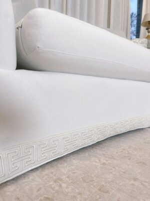 Close-up of Jamie's custom sofa trim and her new Ruggable rug