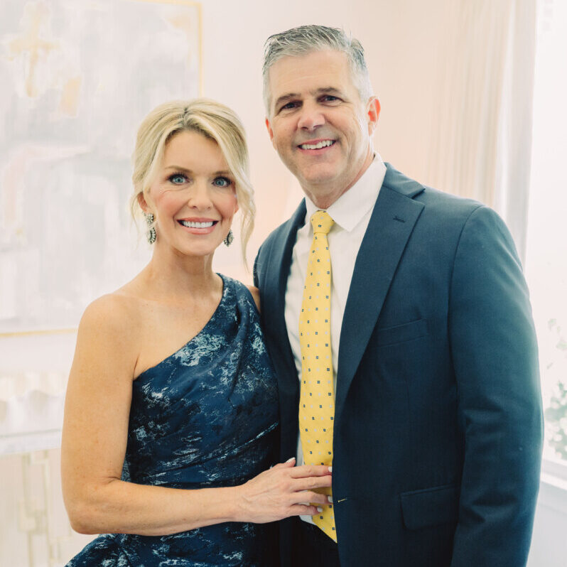 Jamie Tarence of Family Savvy posing with her husband Zane Tarence