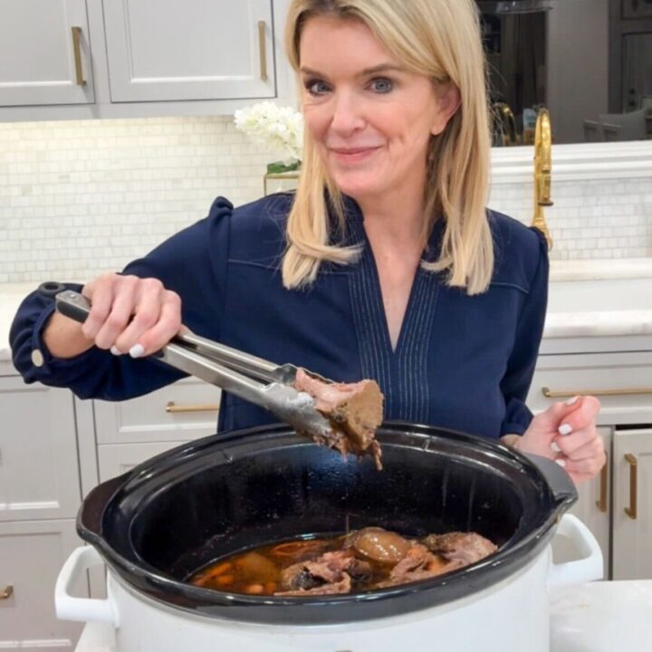 Jamie Tarence of Family Savvy holding a pair of tongs with a chunk or rump roast in it