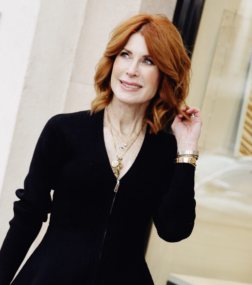 Cathy Williamson, a triple negative breast cancer survivor, walking down the street