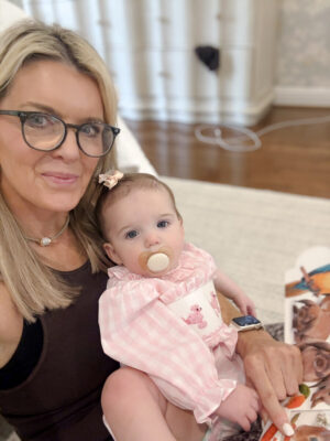 Jamie Tarence holding her grandbaby Anne Parker