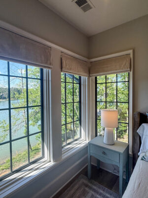 View of the lake from outside a window at Jamie Tarenc'es new lake home