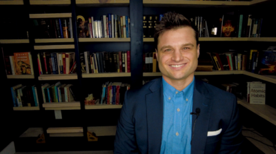 Sean Hiller, a Catholic YouTube creator and Jamie Tarence's son-in-law, sitting in his office
