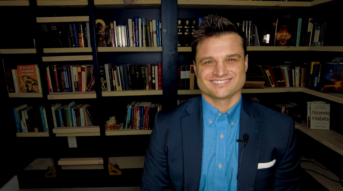 Sean Hiller, a Catholic YouTube creator and Jamie Tarence's son-in-law, sitting in his office