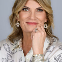 Headshot of Sarah Faulkner, a brain aneurysm survivor and founder of Milk Velvet Pearls
