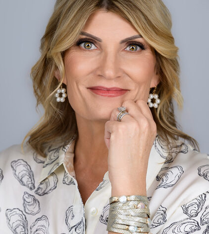 Headshot of Sarah Faulkner, a brain aneurysm survivor and founder of Milk Velvet Pearls